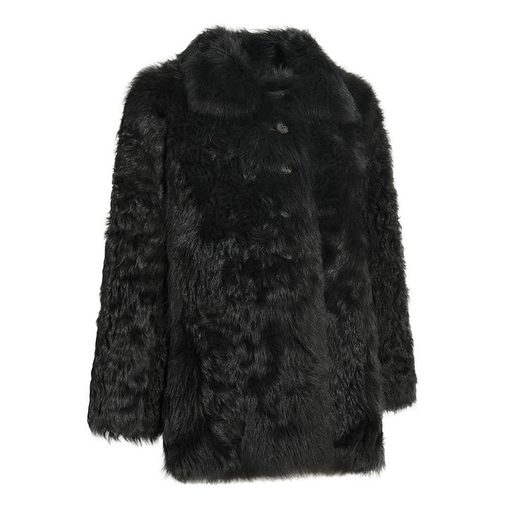 Luxurious black shearling coat featuring rich natural texture, designed to provide cozy comfort and timeless elegance for plus-size silhouettes.