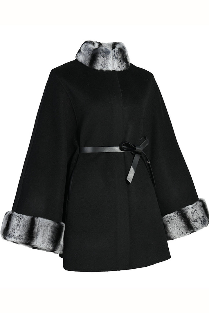 Elegant curve-fit cape in luxurious double-faced cashmere, featuring a classic cut, refined funnel neck, and plush rex rabbit fur detail.