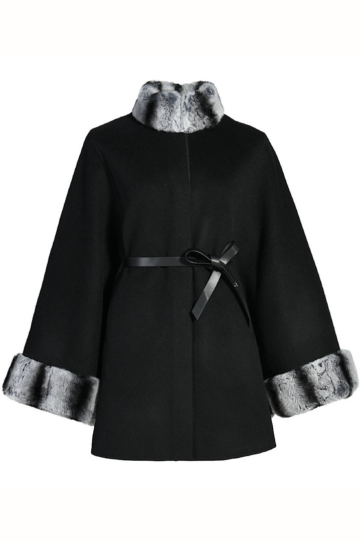 Plus-size double cashmere cape with structured funnel neckline trimmed in soft rex rabbit fur, styled with a removable leather belt for a flattering silhouette.